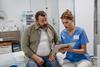 Doctor with obesity patient